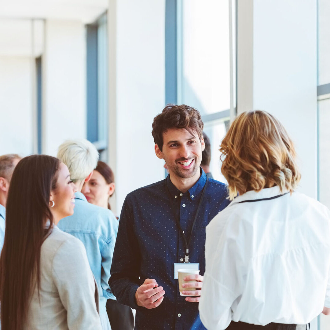 Business people in convention center during coffee break