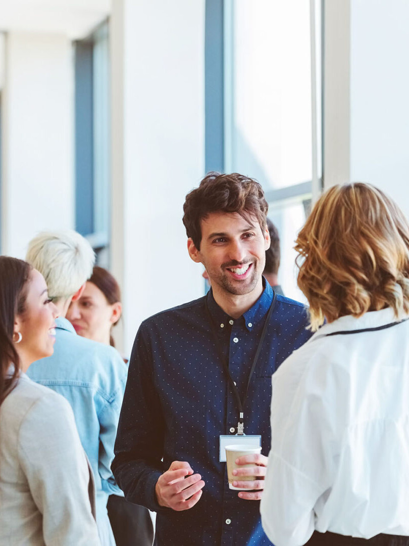 Business people in convention center during coffee break